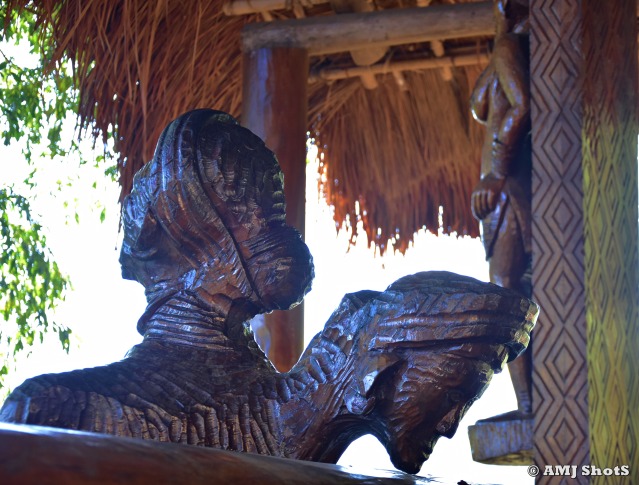 DSC_2376 Wooden sculpture of a two-headed tribal man.